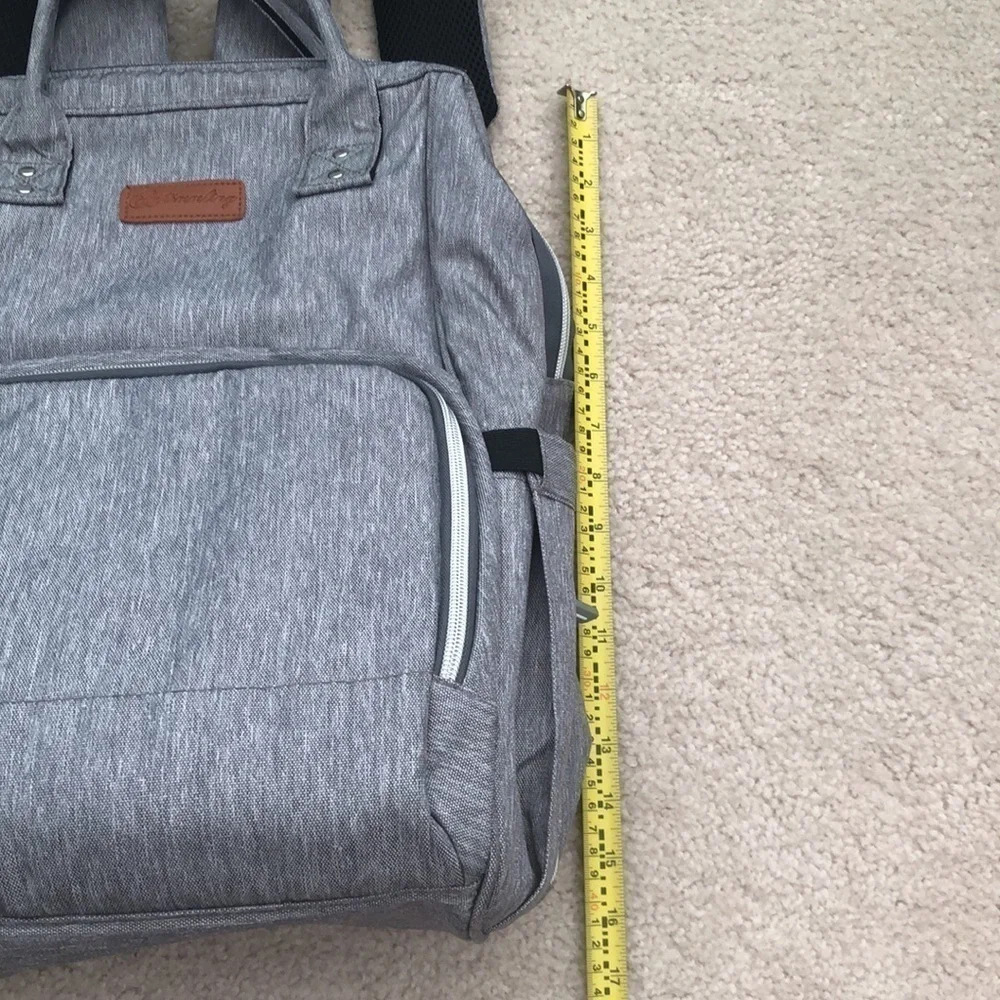 Baby changing gray backpack with multiple pockets